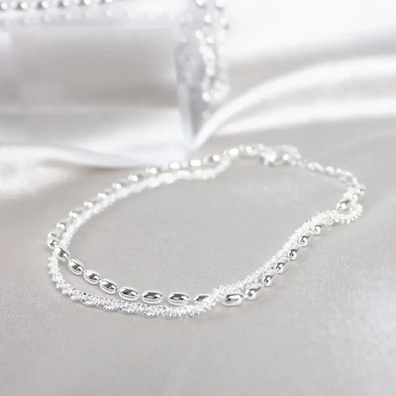 Amparo - Set di Bracciali Argentati Eleganti con Zirconi