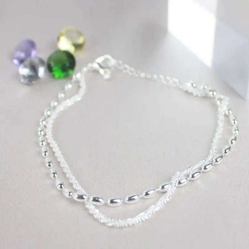 Amparo - Set di Bracciali Argentati Eleganti con Zirconi